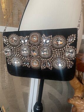 Elegant black velvet evening clutch with intricate embellishments